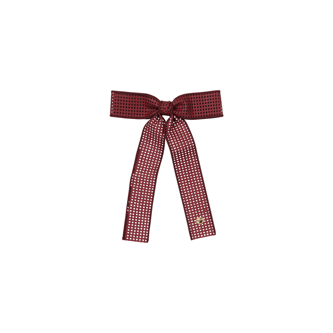 clip perforated leather bow