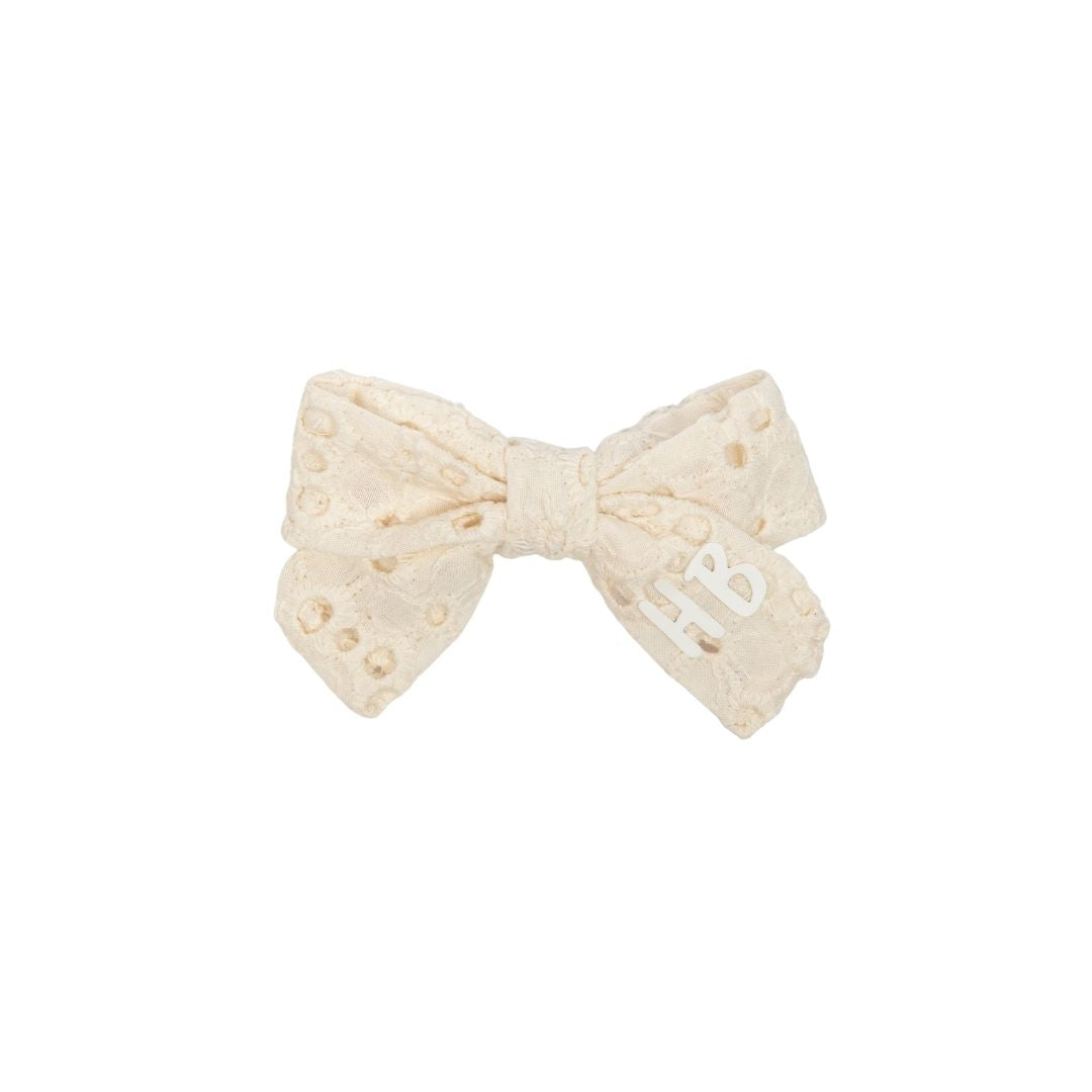 clip heavy eyelet bow