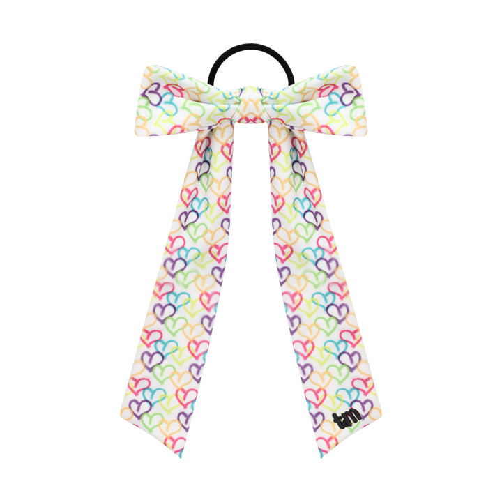 pony long tail sewn onto heart and splatter printed bow