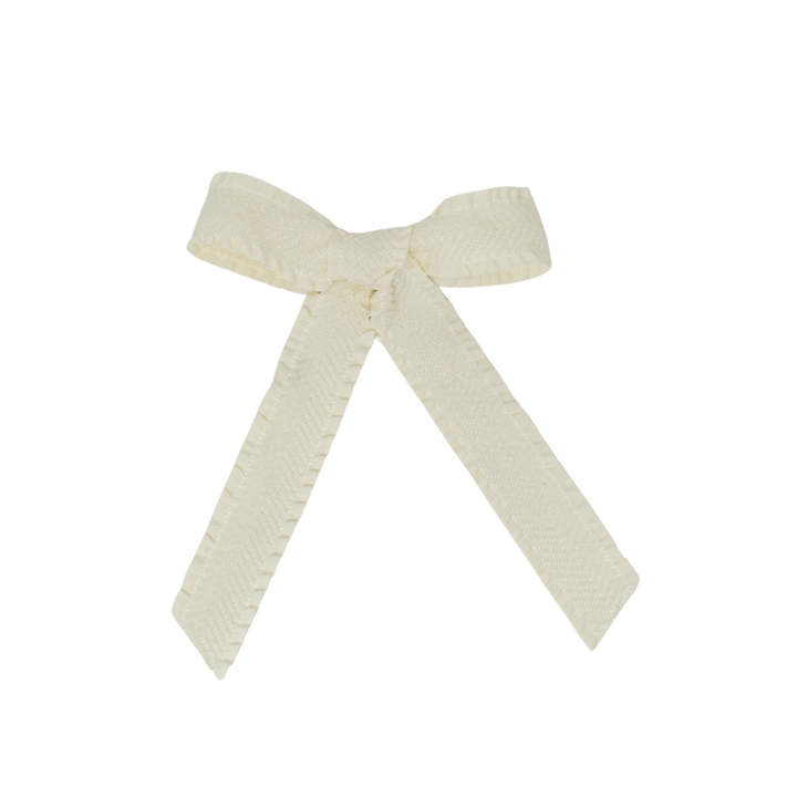 clip bow ruffle velvetty herringbone