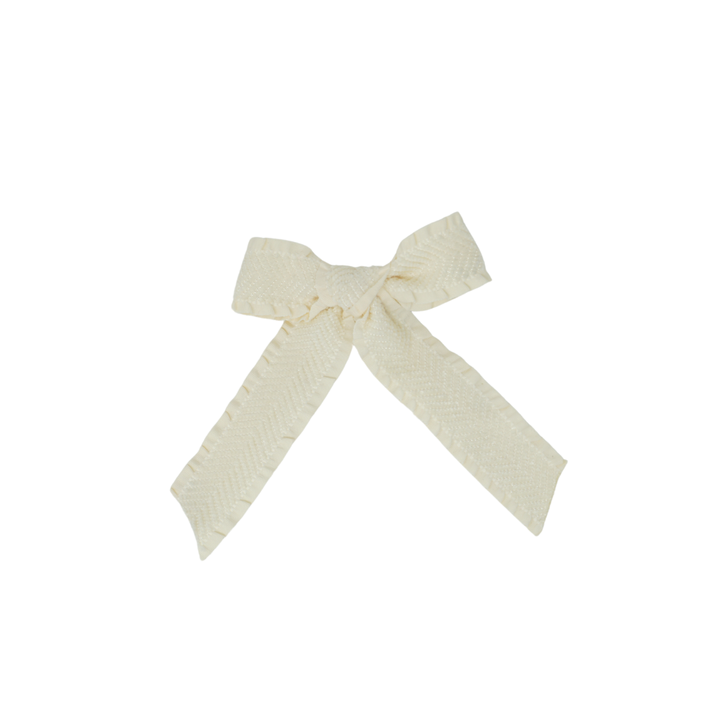 clip bow ruffle velvetty herringbone