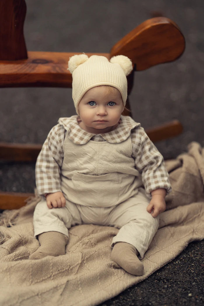 hat rolled edge pom pom beanie