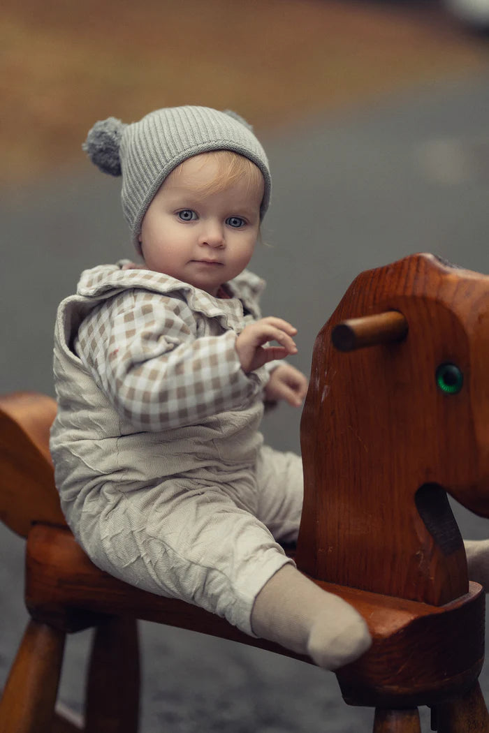 hat rolled edge pom pom beanie